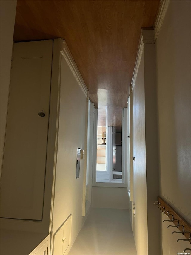 corridor featuring wooden ceiling