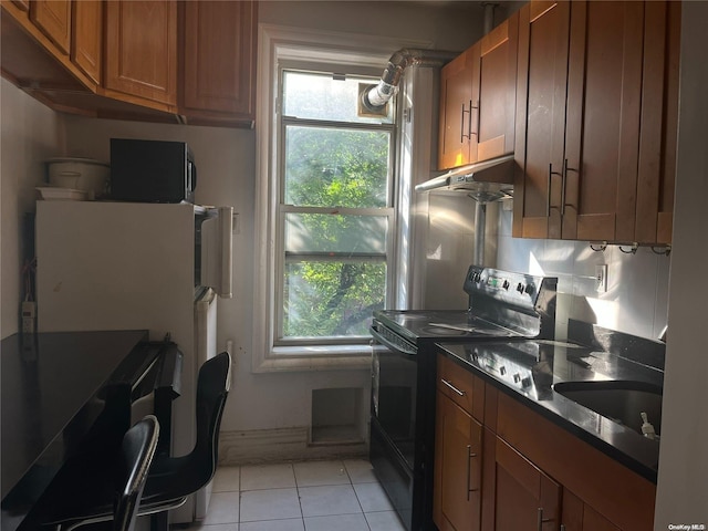 kitchen featuring black range with electric stovetop, sink, light tile patterned flooring, and ventilation hood