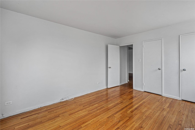 unfurnished bedroom featuring light hardwood / wood-style floors