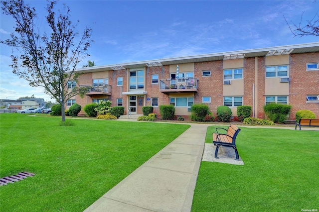 view of community featuring a lawn