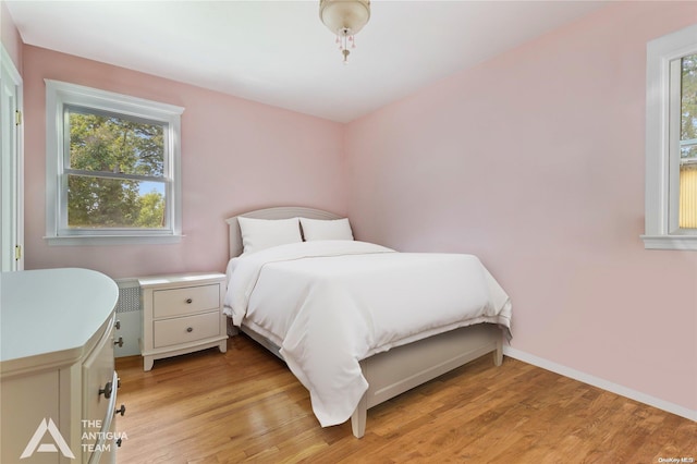 bedroom featuring light hardwood / wood-style floors