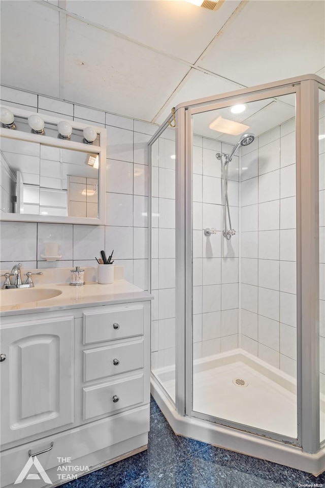 bathroom with vanity and walk in shower