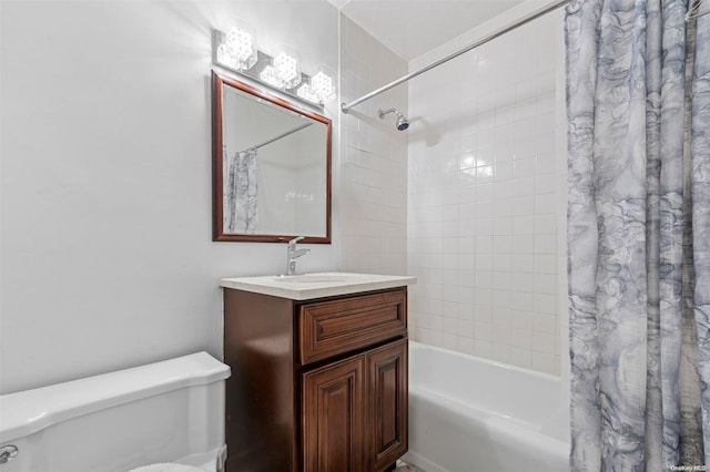 full bathroom with shower / bath combo with shower curtain, vanity, and toilet