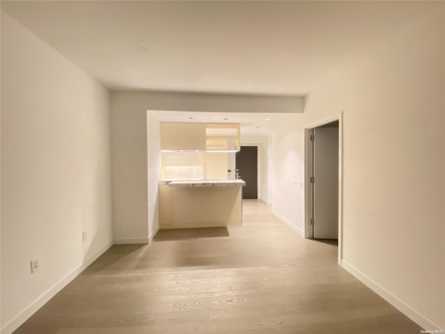 hallway featuring light wood-type flooring