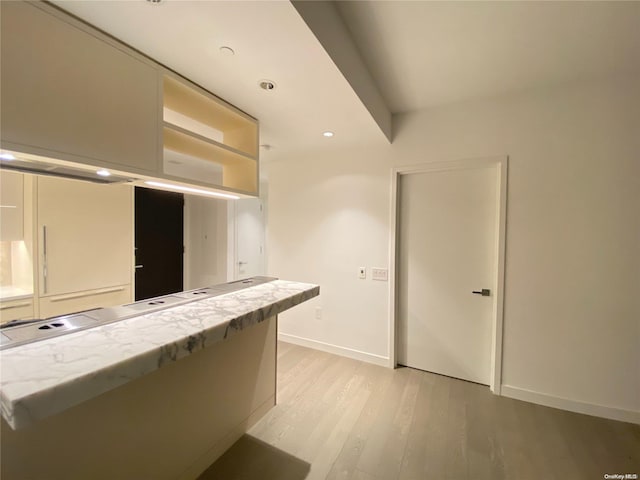 kitchen with light wood-type flooring