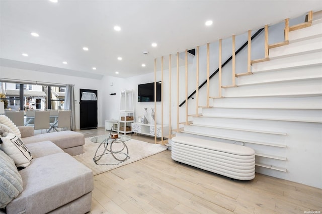 living room with light hardwood / wood-style floors