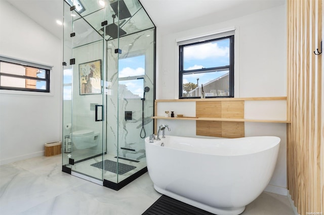 bathroom with separate shower and tub and toilet