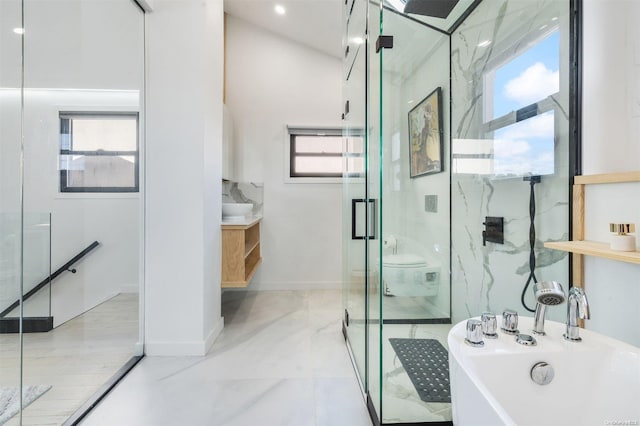 bathroom with toilet and shower with separate bathtub