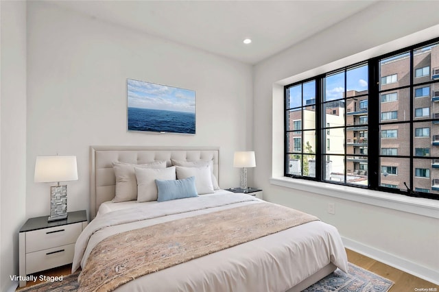 25-25 31st Ave Unit 7B, Astoria, NY 11106 - bedroom featuring wood finished floors and recessed lighting