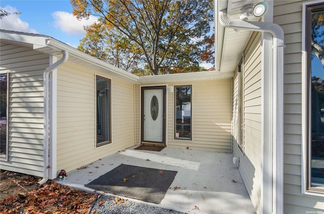 property entrance featuring a patio