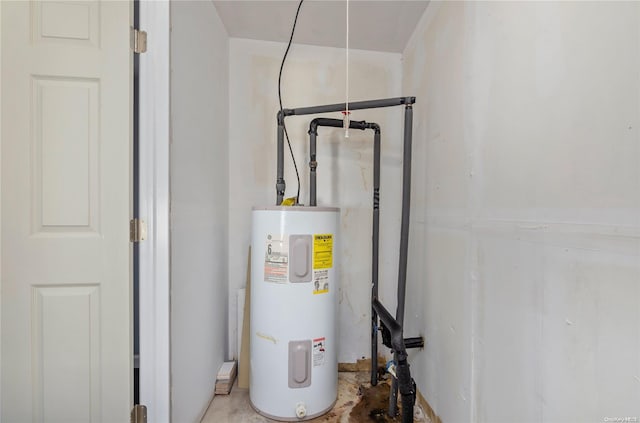 utility room with electric water heater