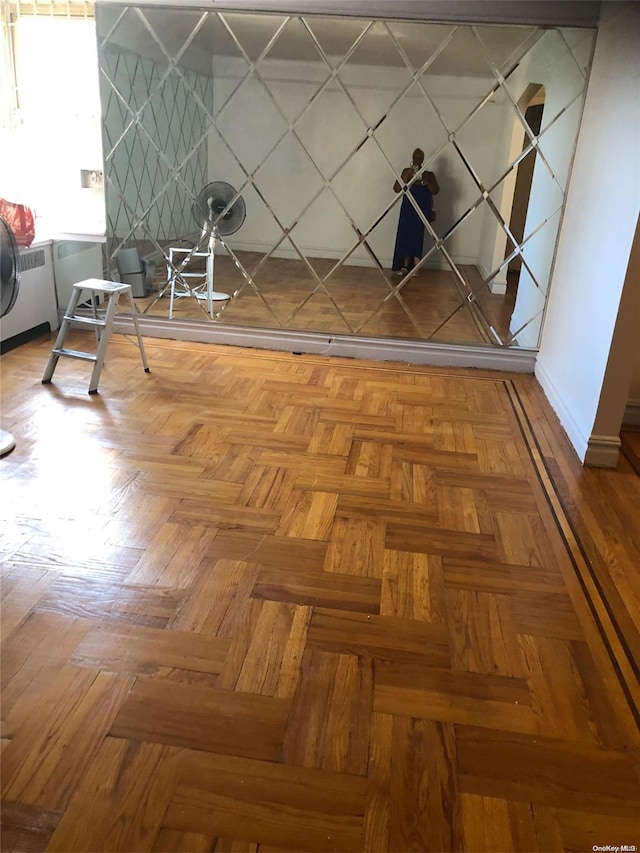 interior space featuring parquet floors