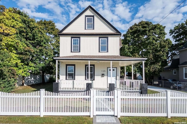 farmhouse inspired home with covered porch