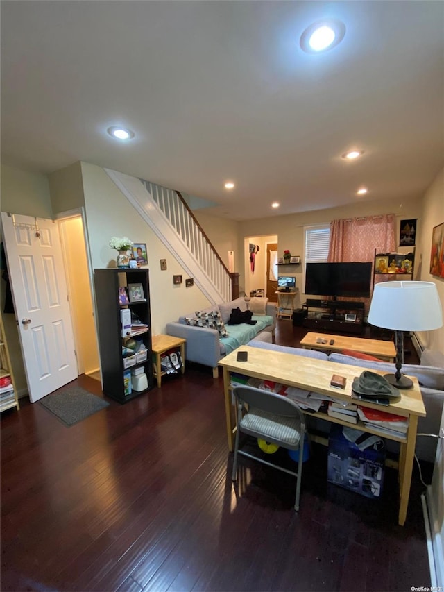 recreation room with dark hardwood / wood-style floors