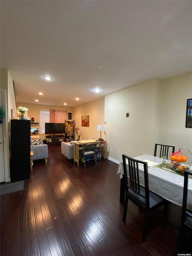 dining area featuring dark hardwood / wood-style flooring