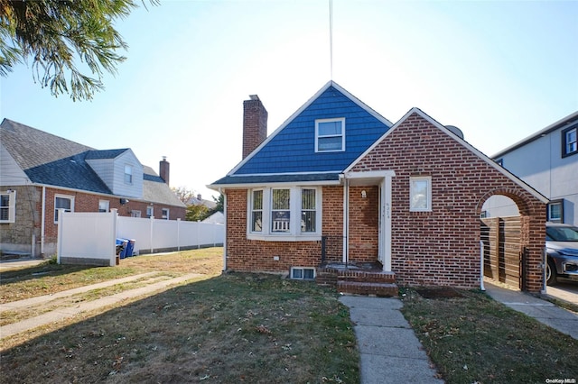 bungalow with a front yard