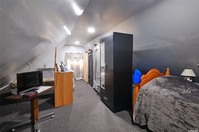 carpeted bedroom featuring vaulted ceiling