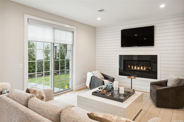 living room with a large fireplace