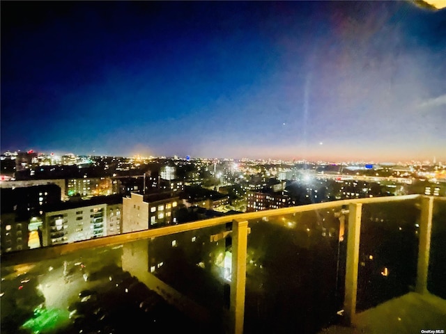 view of balcony at dusk