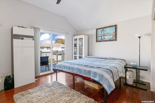 bedroom featuring hardwood / wood-style flooring, ceiling fan, lofted ceiling, and access to outside