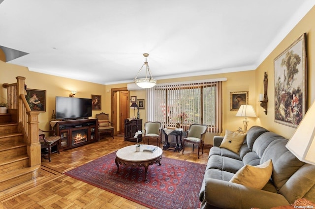 living room featuring parquet floors