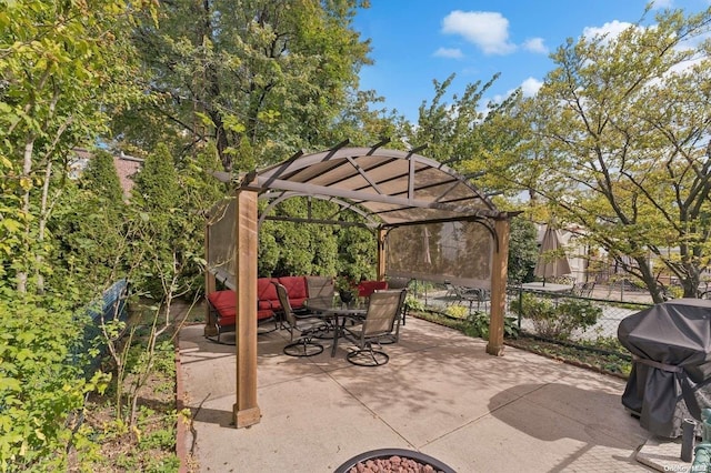 view of patio with a pergola and a grill