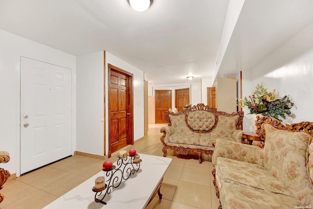 living room with light tile patterned flooring