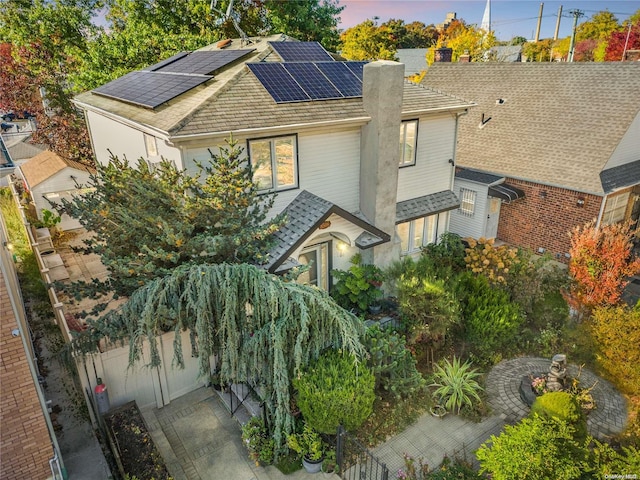 view of front of home with solar panels