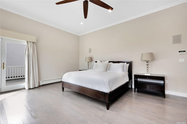 bedroom with ceiling fan, light hardwood / wood-style flooring, ornamental molding, and a baseboard heating unit