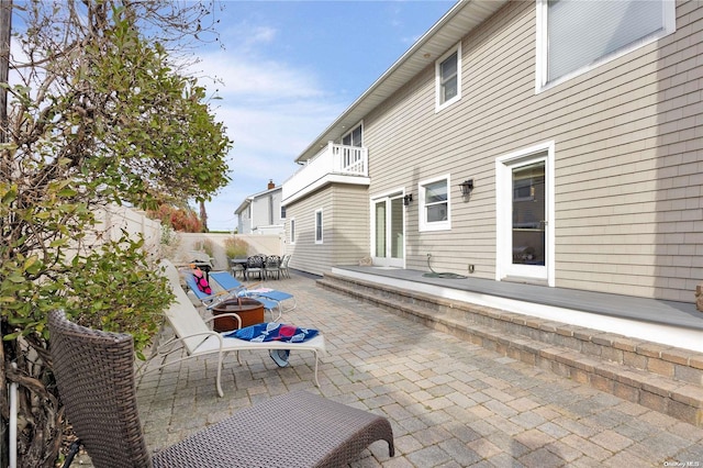 view of patio / terrace with a balcony