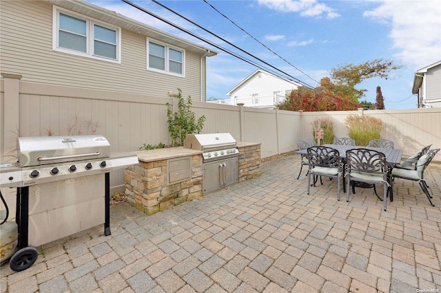 view of patio featuring area for grilling and grilling area