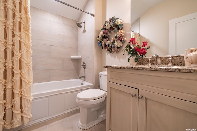 full bathroom with tile patterned flooring, shower / bath combo, vanity, and toilet