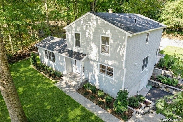 exterior space featuring a front yard