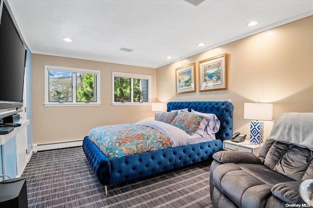 bedroom with carpet flooring, baseboard heating, and crown molding