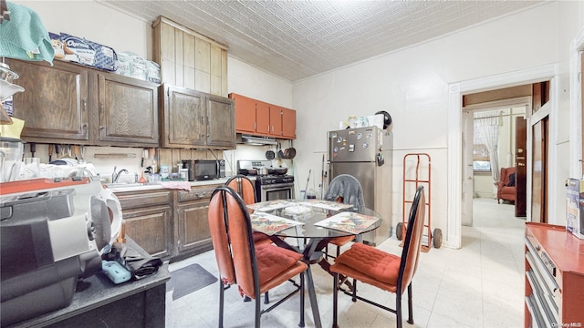 dining room featuring sink