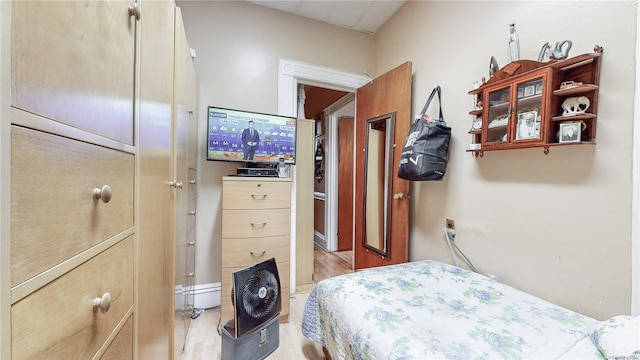 bedroom featuring light wood-type flooring