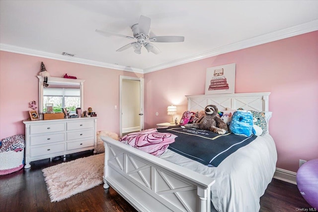 bedroom with ceiling fan, dark hardwood / wood-style floors, and ornamental molding