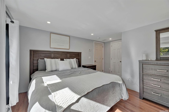 bedroom featuring hardwood / wood-style flooring