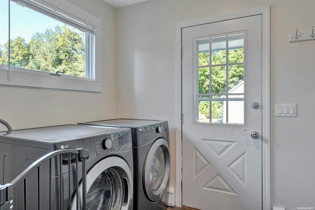18955 Main Rd, Mattituck, NY 11952 - washroom featuring washing machine and clothes dryer and healthy amount of natural light
