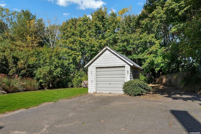 garage with a lawn