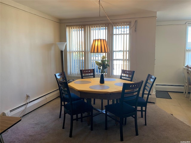 dining area with baseboard heating