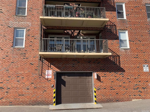 view of building exterior featuring a garage