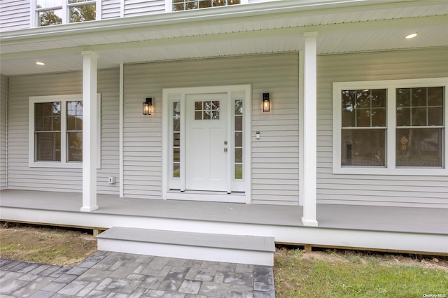 doorway to property featuring a porch