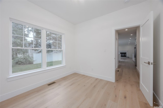 empty room featuring light hardwood / wood-style floors