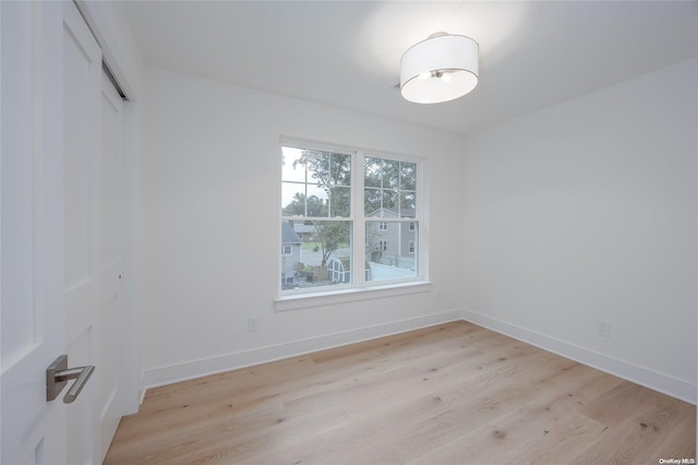 empty room with light wood-type flooring