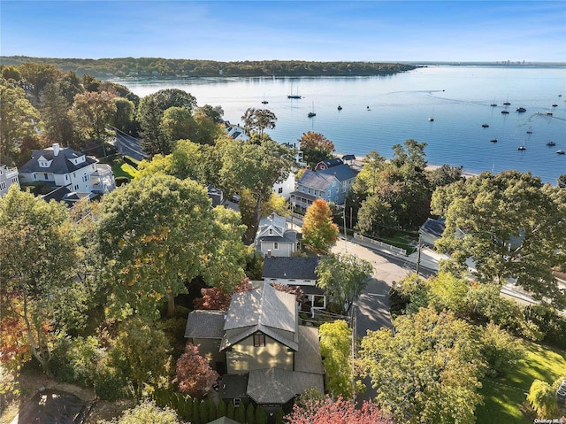 bird's eye view with a water view