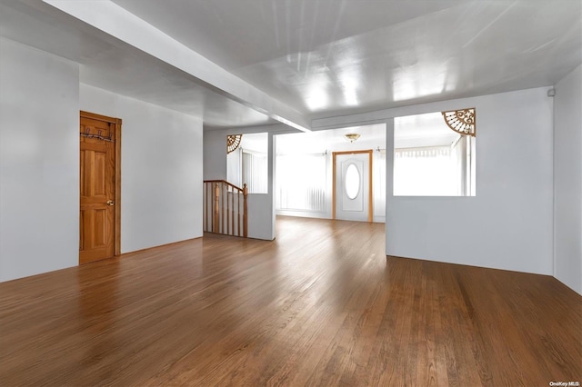 spare room with hardwood / wood-style floors