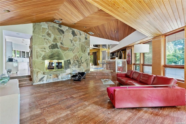 living room with a stone fireplace, hardwood / wood-style floors, wooden ceiling, and lofted ceiling