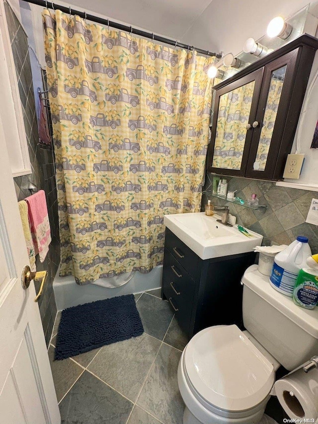 full bathroom featuring tasteful backsplash, tile patterned flooring, toilet, vanity, and shower / tub combo