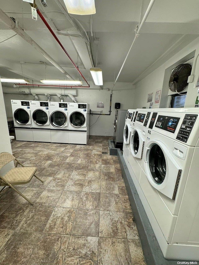 laundry room with washer and clothes dryer